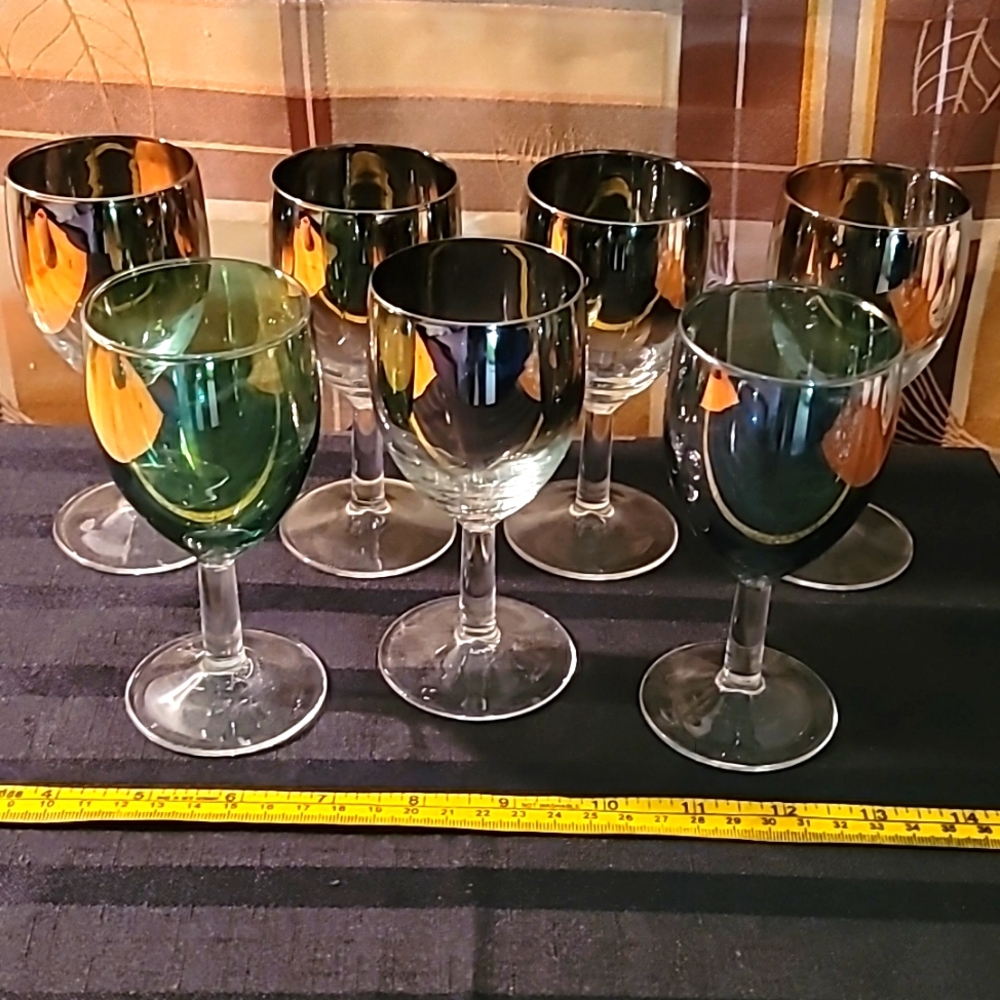 Like like stunning set of 7 wine Glasses colored and metallic made in France